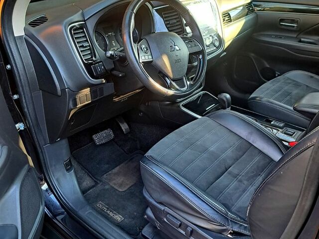 Чорний Міцубісі Аутлендер, об'ємом двигуна 2.4 л та пробігом 102 тис. км за 19200 $, фото 3 на Automoto.ua