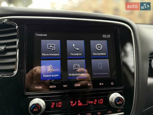 Черный Мицубиси Аутлендер, объемом двигателя 2 л и пробегом 65 тыс. км за 19950 $, фото 38 на Automoto.ua