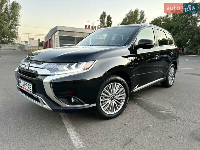 Чорний Міцубісі Аутлендер, об'ємом двигуна 2.36 л та пробігом 66 тис. км за 19800 $, фото 1 на Automoto.ua