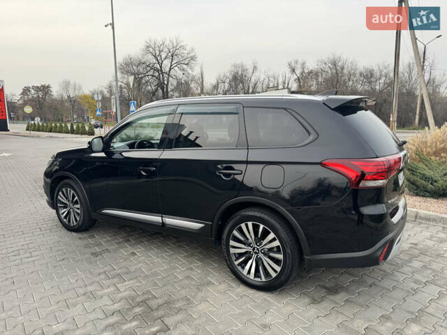 Чорний Міцубісі Аутлендер, об'ємом двигуна 2.36 л та пробігом 53 тис. км за 23500 $, фото 3 на Automoto.ua