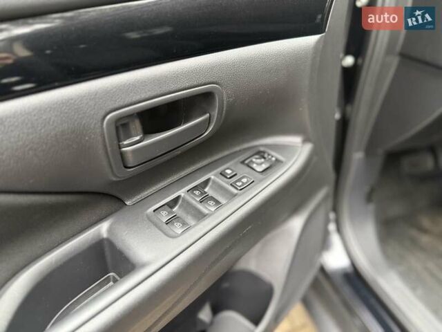 Черный Мицубиси Аутлендер, объемом двигателя 2 л и пробегом 65 тыс. км за 19950 $, фото 22 на Automoto.ua