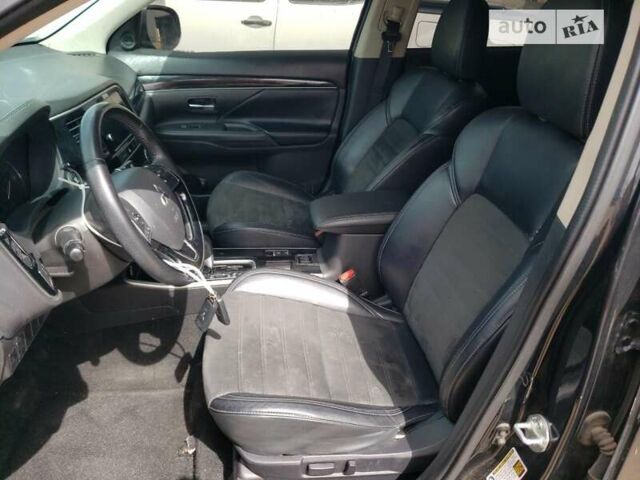 Черный Мицубиси Аутлендер, объемом двигателя 2.36 л и пробегом 135 тыс. км за 2800 $, фото 4 на Automoto.ua