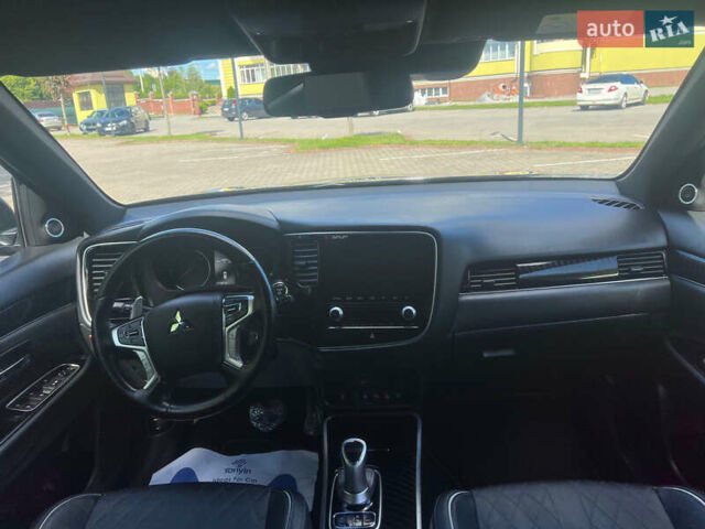 Чорний Міцубісі Аутлендер, об'ємом двигуна 2.36 л та пробігом 174 тис. км за 27800 $, фото 35 на Automoto.ua