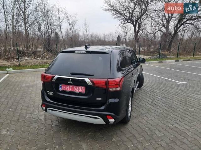 Черный Мицубиси Аутлендер, объемом двигателя 2.36 л и пробегом 127 тыс. км за 20800 $, фото 16 на Automoto.ua