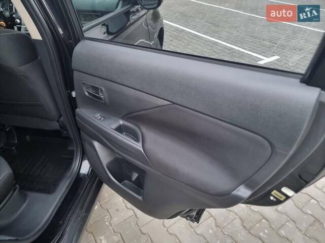 Черный Мицубиси Аутлендер, объемом двигателя 2.36 л и пробегом 127 тыс. км за 20800 $, фото 42 на Automoto.ua