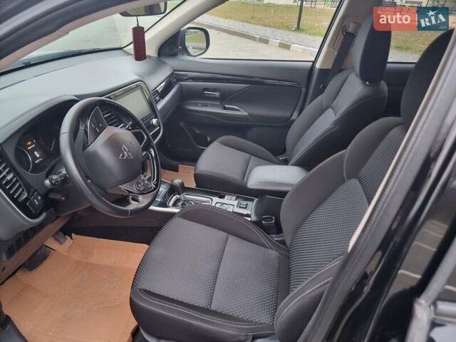 Черный Мицубиси Аутлендер, объемом двигателя 2.36 л и пробегом 127 тыс. км за 20800 $, фото 20 на Automoto.ua