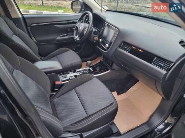 Черный Мицубиси Аутлендер, объемом двигателя 2.36 л и пробегом 127 тыс. км за 20800 $, фото 45 на Automoto.ua