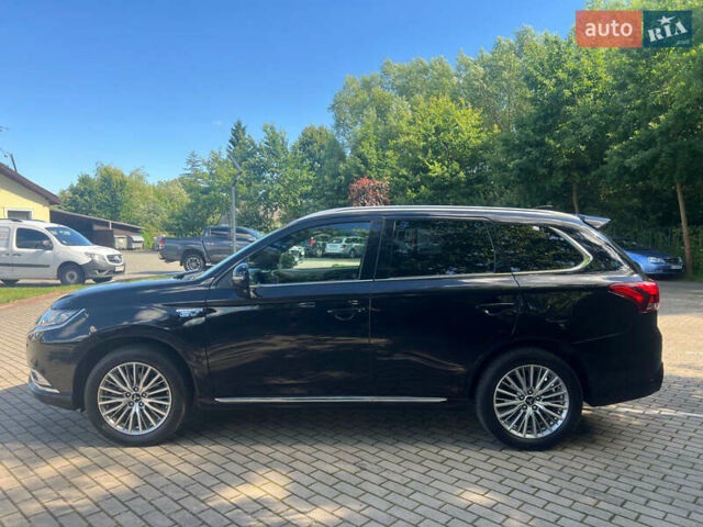 Чорний Міцубісі Аутлендер, об'ємом двигуна 2.36 л та пробігом 174 тис. км за 27800 $, фото 3 на Automoto.ua