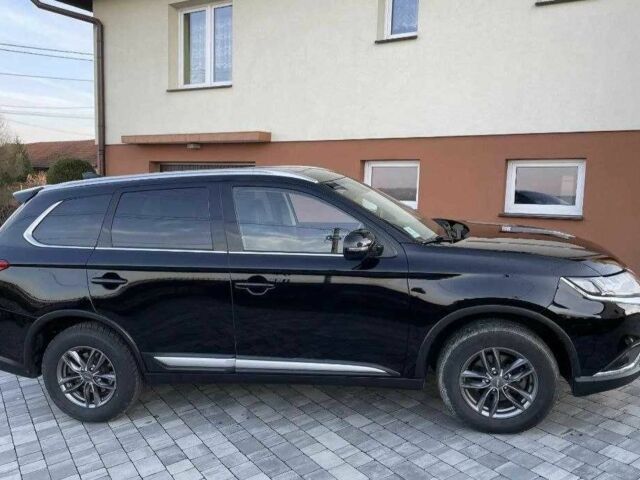 Черный Мицубиси Аутлендер, объемом двигателя 2.4 л и пробегом 1 тыс. км за 14400 $, фото 4 на Automoto.ua