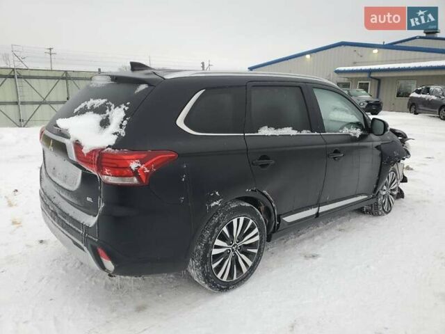 Черный Мицубиси Аутлендер, объемом двигателя 2.36 л и пробегом 84 тыс. км за 3000 $, фото 2 на Automoto.ua