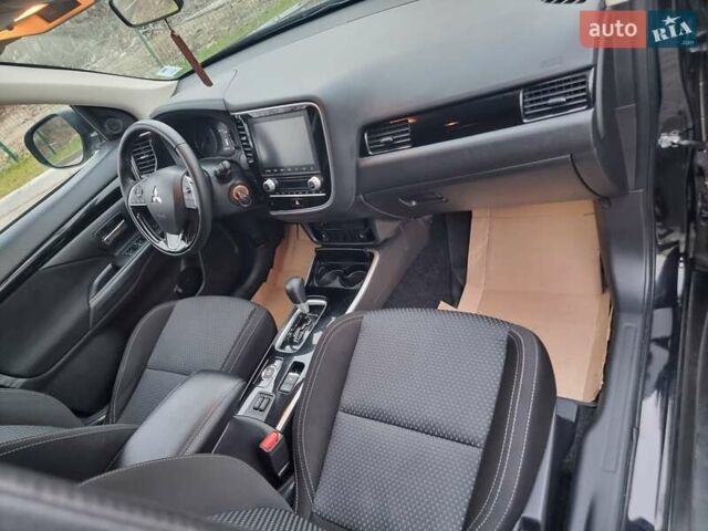 Черный Мицубиси Аутлендер, объемом двигателя 2.36 л и пробегом 127 тыс. км за 20800 $, фото 47 на Automoto.ua