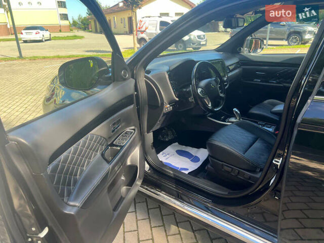 Чорний Міцубісі Аутлендер, об'ємом двигуна 2.36 л та пробігом 174 тис. км за 27800 $, фото 25 на Automoto.ua