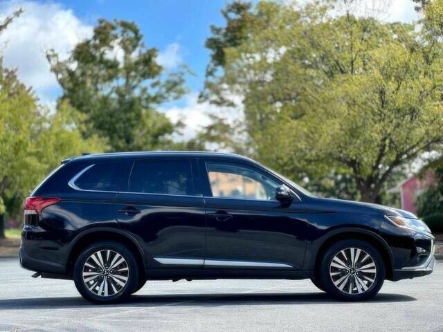 Черный Мицубиси Аутлендер, объемом двигателя 2.4 л и пробегом 46 тыс. км за 3000 $, фото 7 на Automoto.ua