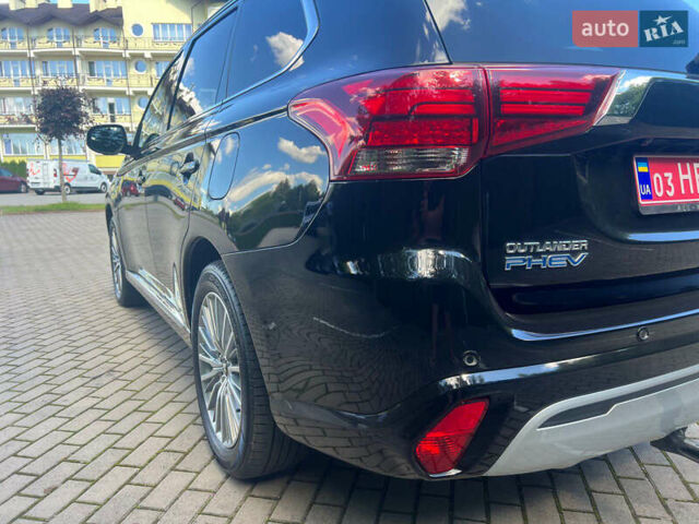 Чорний Міцубісі Аутлендер, об'ємом двигуна 2.36 л та пробігом 174 тис. км за 27800 $, фото 10 на Automoto.ua