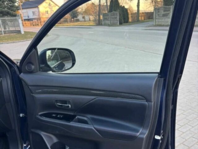 Черный Мицубиси Аутлендер, объемом двигателя 2.4 л и пробегом 38 тыс. км за 14000 $, фото 1 на Automoto.ua