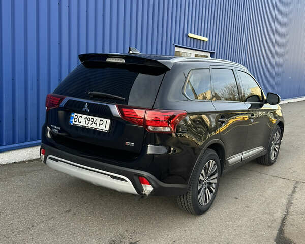 Чорний Міцубісі Аутлендер, об'ємом двигуна 2.36 л та пробігом 80 тис. км за 18300 $, фото 55 на Automoto.ua
