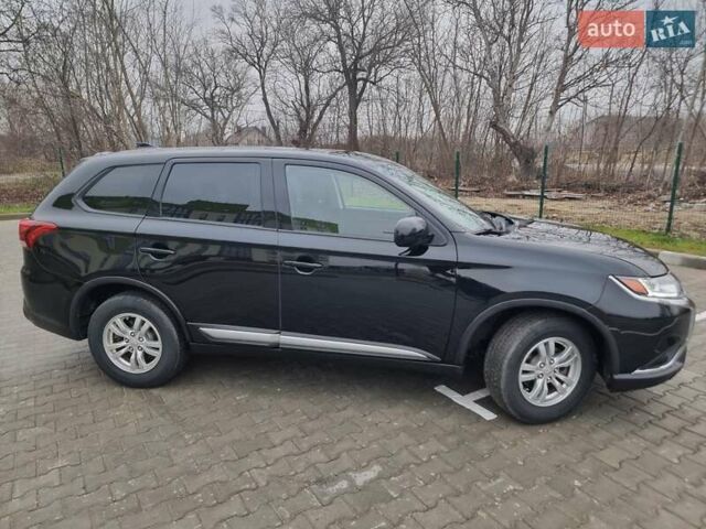Черный Мицубиси Аутлендер, объемом двигателя 2.36 л и пробегом 127 тыс. км за 20800 $, фото 8 на Automoto.ua