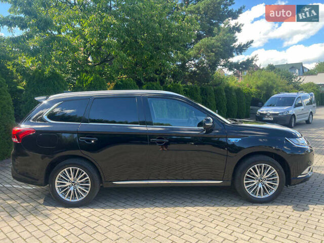 Чорний Міцубісі Аутлендер, об'ємом двигуна 2.36 л та пробігом 174 тис. км за 27800 $, фото 7 на Automoto.ua