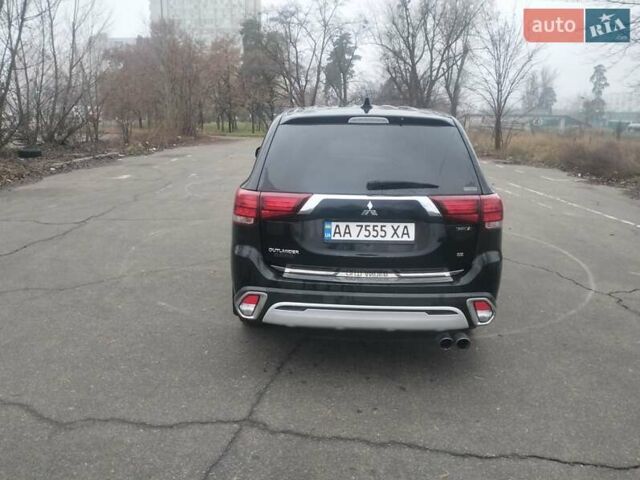 Черный Мицубиси Аутлендер, объемом двигателя 2.4 л и пробегом 81 тыс. км за 20900 $, фото 3 на Automoto.ua