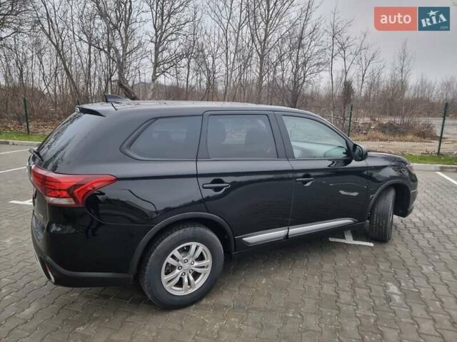 Черный Мицубиси Аутлендер, объемом двигателя 2.36 л и пробегом 127 тыс. км за 20800 $, фото 7 на Automoto.ua