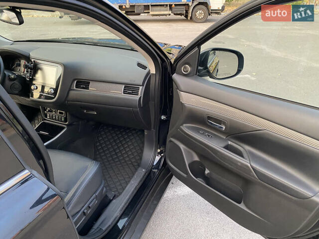 Черный Мицубиси Аутлендер, объемом двигателя 2.36 л и пробегом 39 тыс. км за 22800 $, фото 11 на Automoto.ua