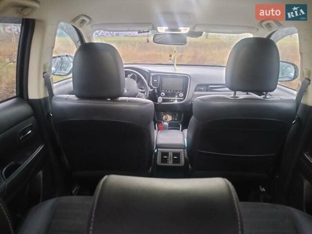 Черный Мицубиси Аутлендер, объемом двигателя 2.4 л и пробегом 81 тыс. км за 20900 $, фото 11 на Automoto.ua