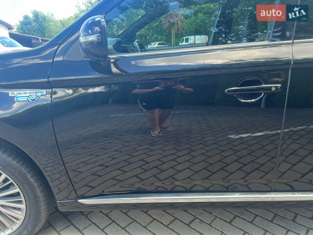 Чорний Міцубісі Аутлендер, об'ємом двигуна 2.36 л та пробігом 174 тис. км за 27800 $, фото 14 на Automoto.ua