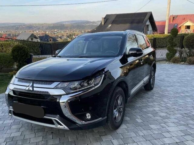 Черный Мицубиси Аутлендер, объемом двигателя 2.4 л и пробегом 1 тыс. км за 14400 $, фото 3 на Automoto.ua