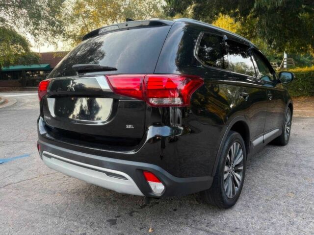 Черный Мицубиси Аутлендер, объемом двигателя 2.4 л и пробегом 49 тыс. км за 12400 $, фото 6 на Automoto.ua