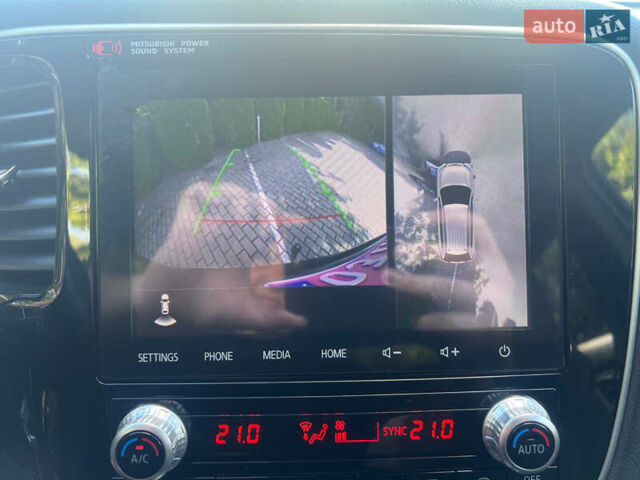 Чорний Міцубісі Аутлендер, об'ємом двигуна 2.36 л та пробігом 174 тис. км за 27800 $, фото 40 на Automoto.ua