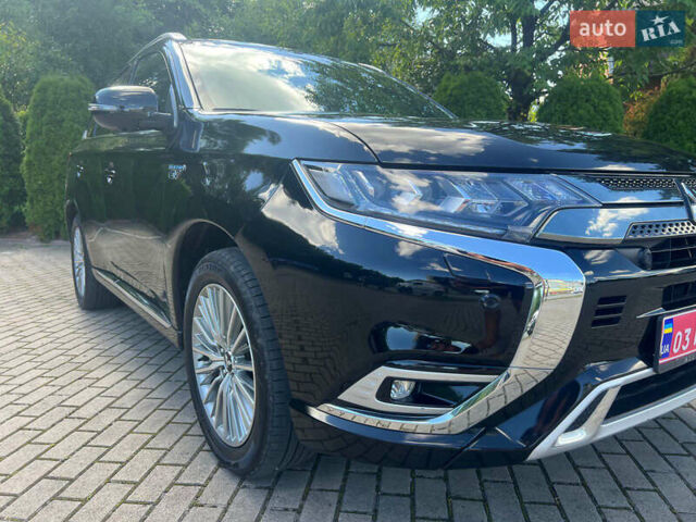 Чорний Міцубісі Аутлендер, об'ємом двигуна 2.36 л та пробігом 174 тис. км за 27800 $, фото 11 на Automoto.ua