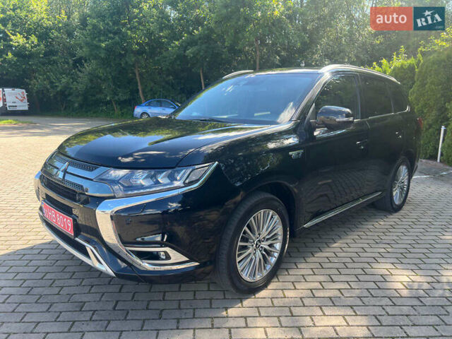 Чорний Міцубісі Аутлендер, об'ємом двигуна 2.36 л та пробігом 174 тис. км за 27800 $, фото 2 на Automoto.ua
