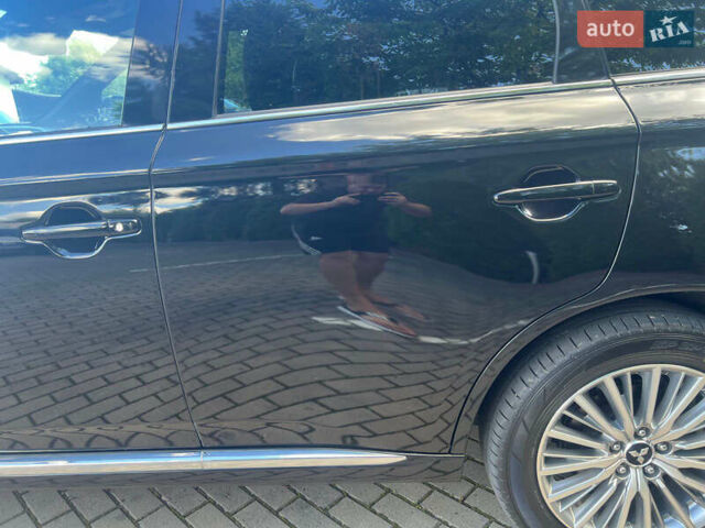 Чорний Міцубісі Аутлендер, об'ємом двигуна 2.36 л та пробігом 174 тис. км за 27800 $, фото 15 на Automoto.ua