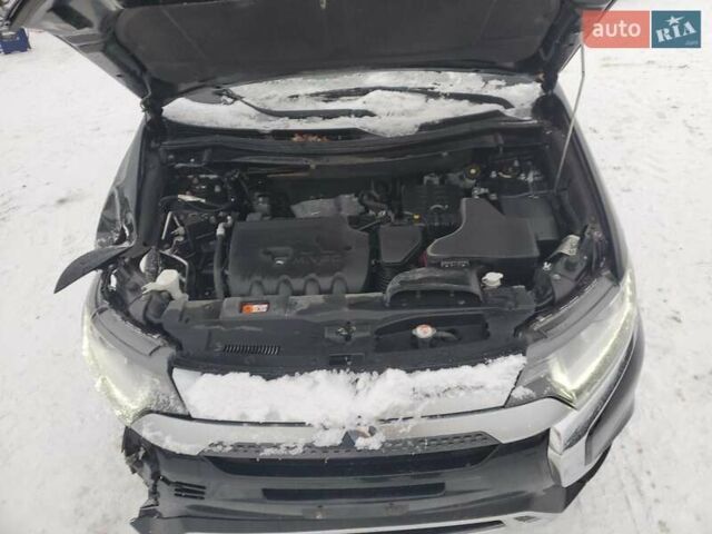 Черный Мицубиси Аутлендер, объемом двигателя 2.36 л и пробегом 84 тыс. км за 3000 $, фото 11 на Automoto.ua