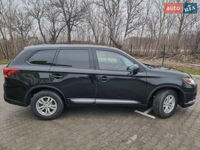 Черный Мицубиси Аутлендер, объемом двигателя 2.36 л и пробегом 127 тыс. км за 20800 $, фото 9 на Automoto.ua