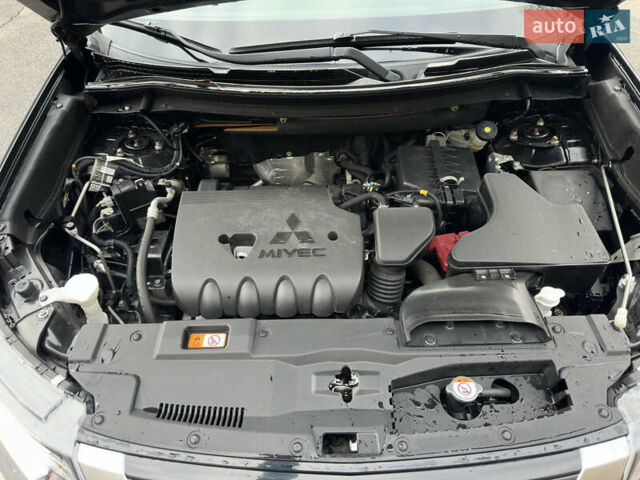 Черный Мицубиси Аутлендер, объемом двигателя 2.4 л и пробегом 44 тыс. км за 18700 $, фото 20 на Automoto.ua