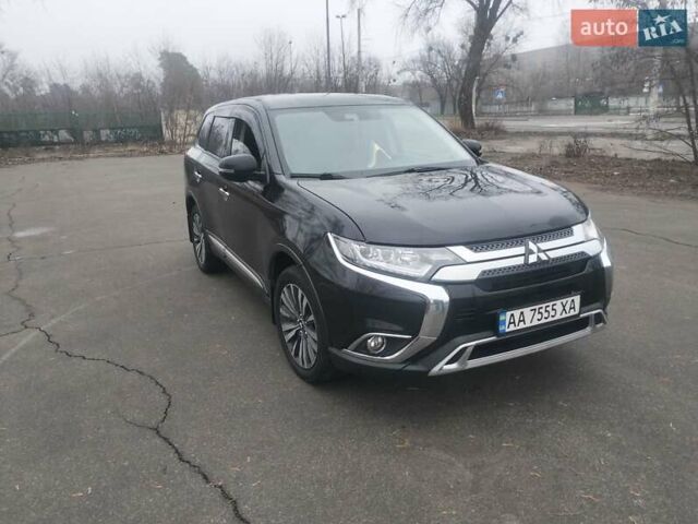 Черный Мицубиси Аутлендер, объемом двигателя 2.4 л и пробегом 81 тыс. км за 20900 $, фото 1 на Automoto.ua