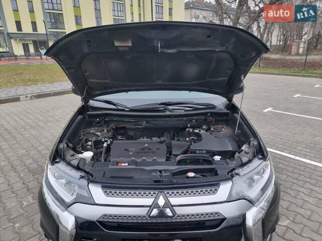 Черный Мицубиси Аутлендер, объемом двигателя 2.36 л и пробегом 127 тыс. км за 20800 $, фото 49 на Automoto.ua