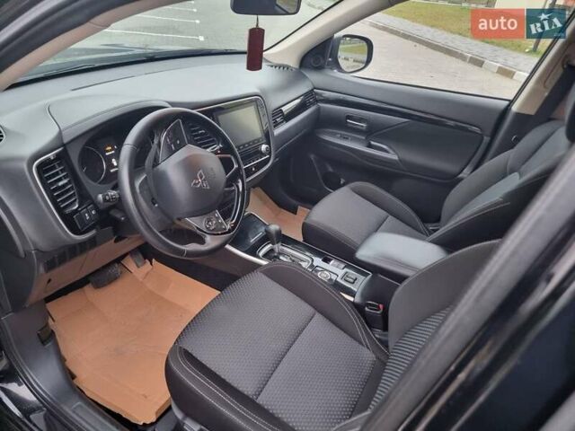 Черный Мицубиси Аутлендер, объемом двигателя 2.36 л и пробегом 127 тыс. км за 20800 $, фото 22 на Automoto.ua