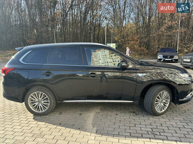 Чорний Міцубісі Аутлендер, об'ємом двигуна 2.36 л та пробігом 174 тис. км за 27800 $, фото 55 на Automoto.ua