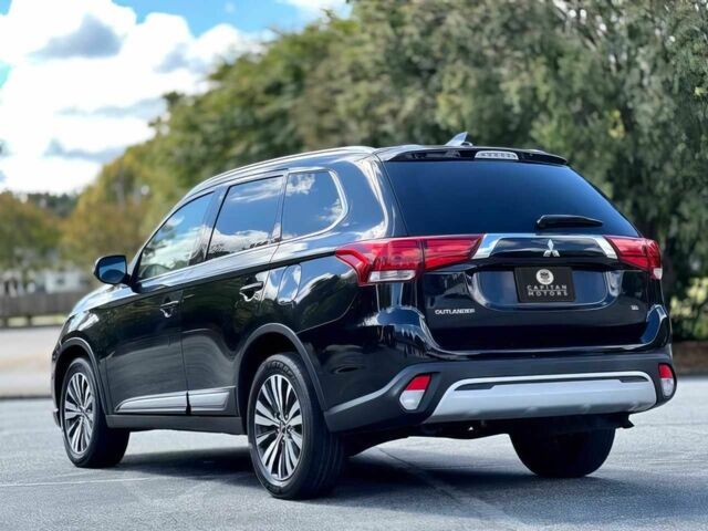 Черный Мицубиси Аутлендер, объемом двигателя 2.4 л и пробегом 46 тыс. км за 3000 $, фото 4 на Automoto.ua