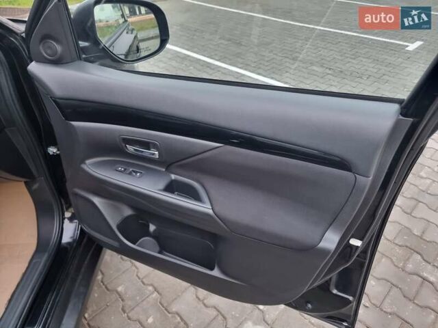 Черный Мицубиси Аутлендер, объемом двигателя 2.36 л и пробегом 127 тыс. км за 20800 $, фото 44 на Automoto.ua