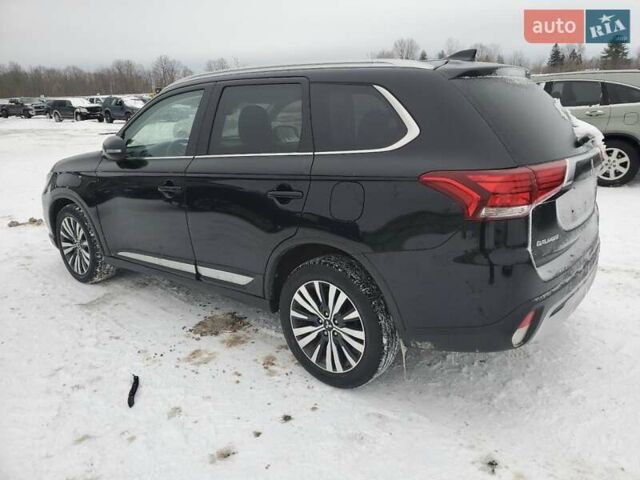 Черный Мицубиси Аутлендер, объемом двигателя 2.36 л и пробегом 84 тыс. км за 3000 $, фото 1 на Automoto.ua