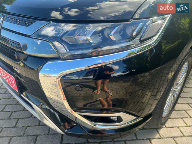 Чорний Міцубісі Аутлендер, об'ємом двигуна 2.36 л та пробігом 174 тис. км за 27800 $, фото 22 на Automoto.ua