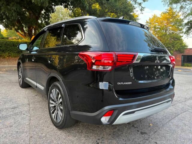 Черный Мицубиси Аутлендер, объемом двигателя 2.4 л и пробегом 49 тыс. км за 12400 $, фото 4 на Automoto.ua