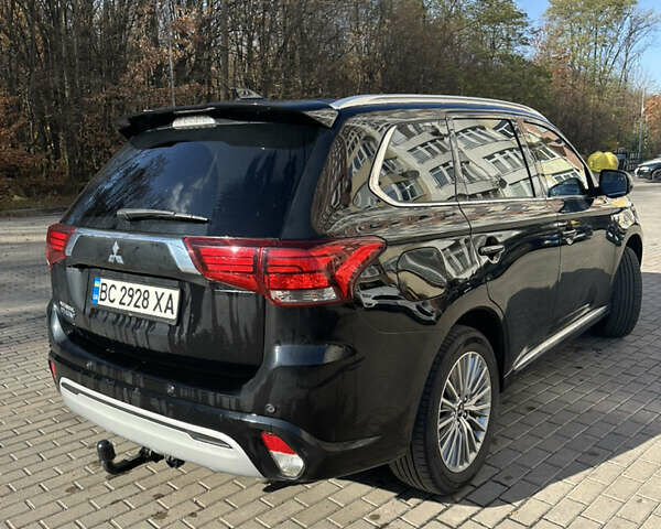 Чорний Міцубісі Аутлендер, об'ємом двигуна 2.36 л та пробігом 174 тис. км за 27800 $, фото 53 на Automoto.ua