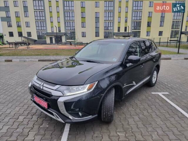 Черный Мицубиси Аутлендер, объемом двигателя 2.36 л и пробегом 127 тыс. км за 20800 $, фото 17 на Automoto.ua