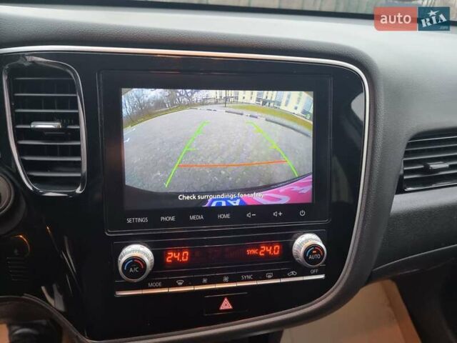 Черный Мицубиси Аутлендер, объемом двигателя 2.36 л и пробегом 127 тыс. км за 20800 $, фото 28 на Automoto.ua