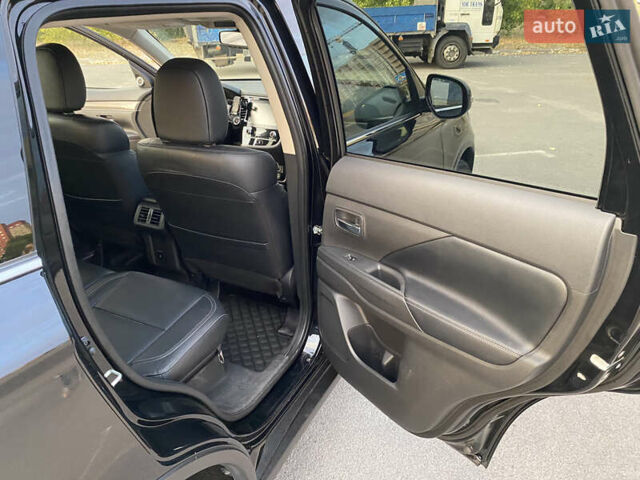 Черный Мицубиси Аутлендер, объемом двигателя 2.36 л и пробегом 39 тыс. км за 22800 $, фото 12 на Automoto.ua