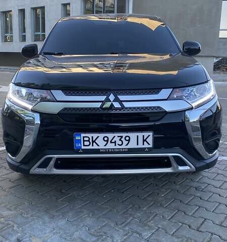 Черный Мицубиси Аутлендер, объемом двигателя 2.36 л и пробегом 93 тыс. км за 18300 $, фото 6 на Automoto.ua